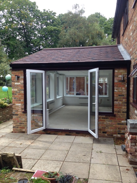 external guardian solid roof with french doors and burnt umber tiles