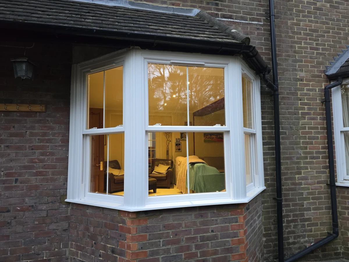 white vertical sliding bay windows external