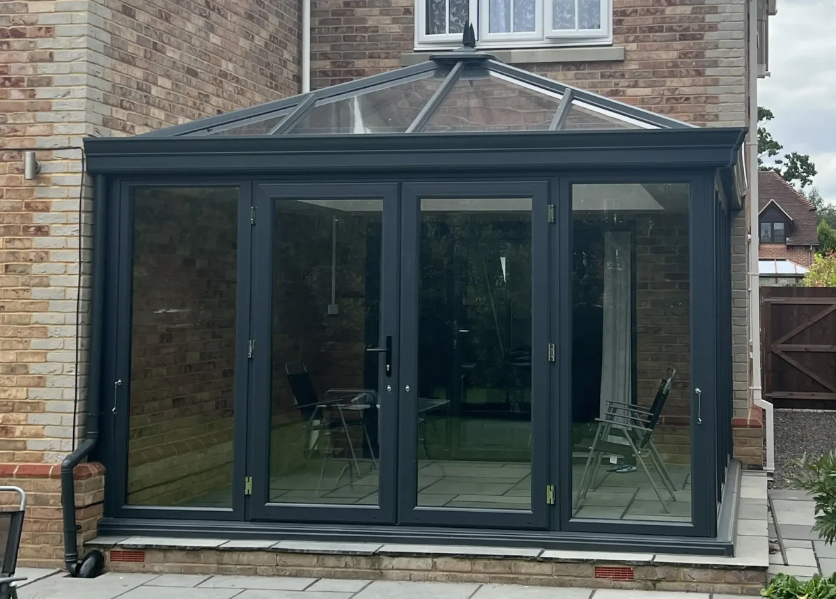 edwardian conservatory with anthracite grey french doors