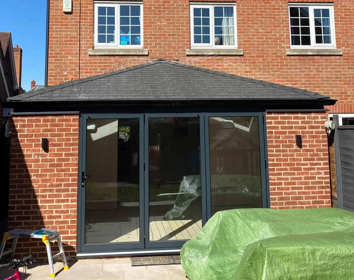 edwardian solid roof with bifold doors