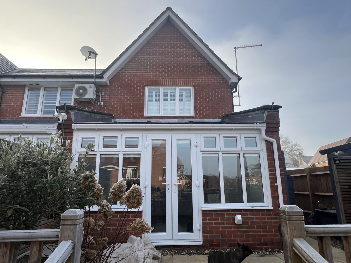 guardian roof and white french doors on a frosty day