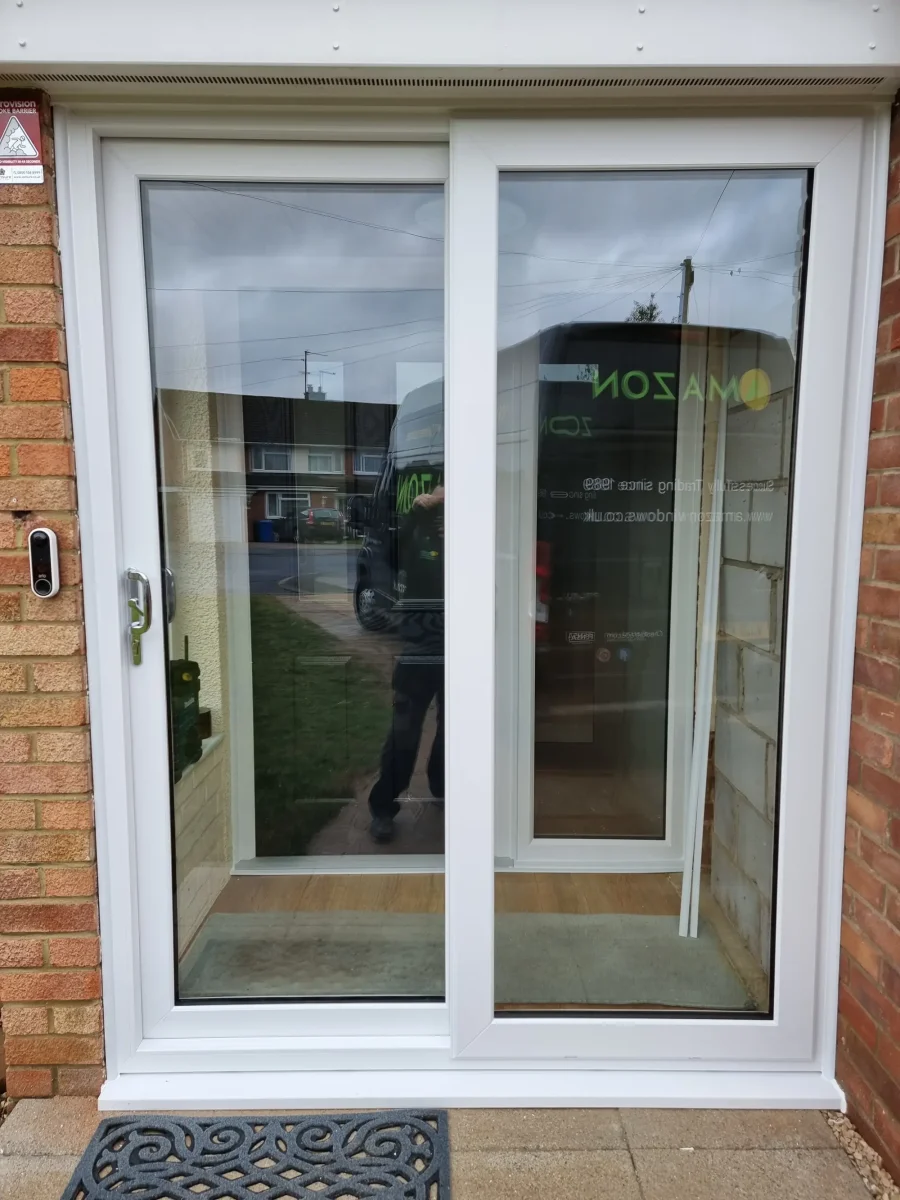 white patio door in pale brickwork